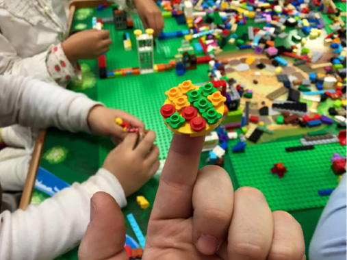 Children building with LEGOs