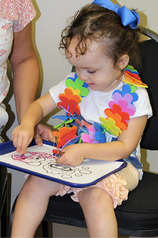 Young girl coloring