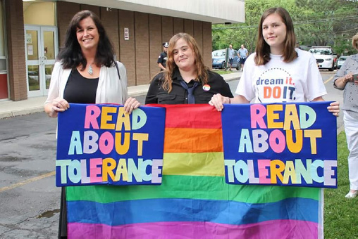 Supporters rallied outside the Olean Public Library to make their voices heard about drag queen storytimes.