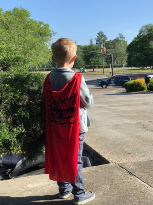 Just another caped fan waiting for his superhero—Dav Pilkey!