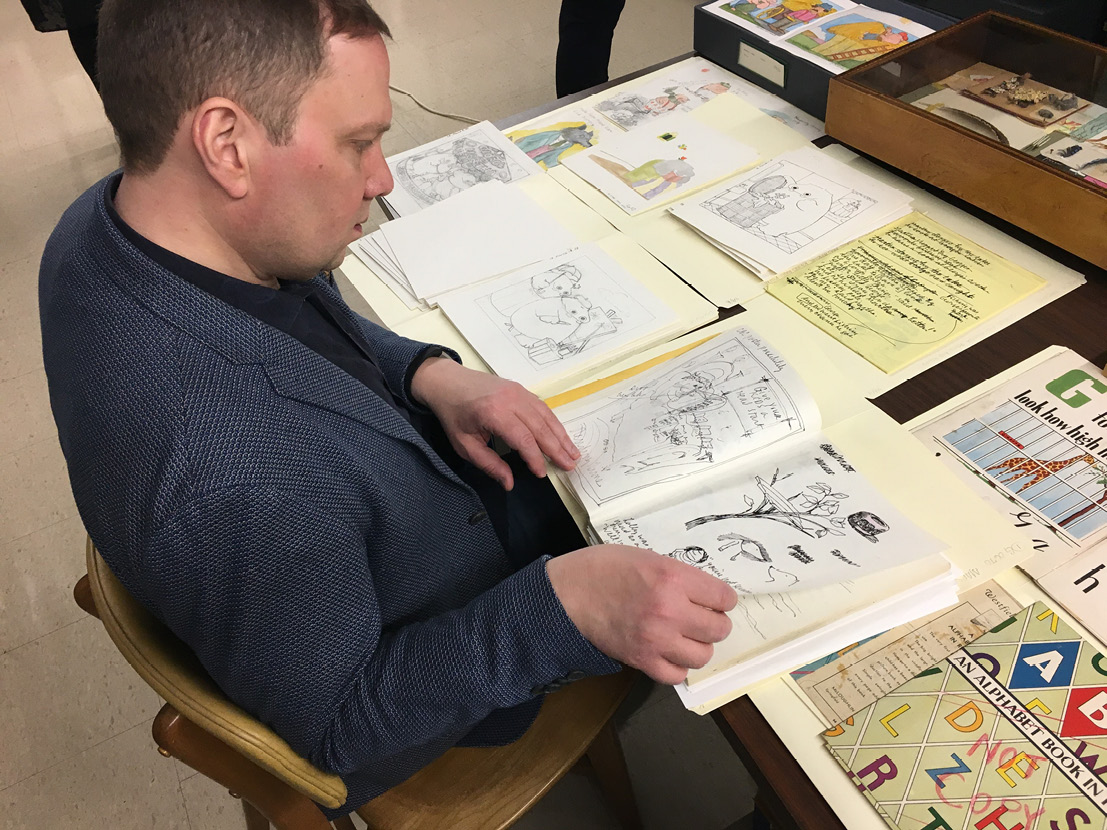 Author Dav Pilkey checks out artwork by one of his favorite artists, James Marshall, in the DeGrummond exhibit room.