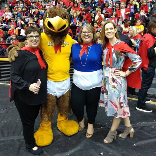 Left to right: Ellen Ruffin, Seymour the Eagle, Sarah Mangrum of the Mississippi Library Association, and Karen Rowell, director of the Fay B. Kaigler Book Festival.