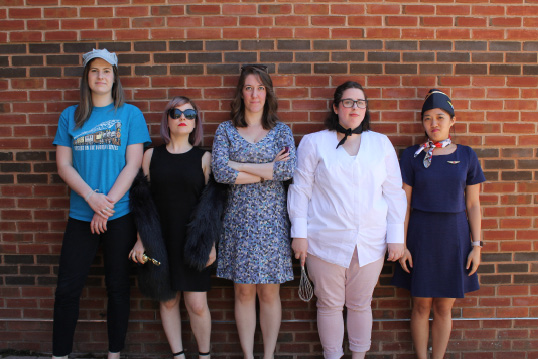 Suspects, and youth service librarians, line up for the Mystery on the Darien Express.