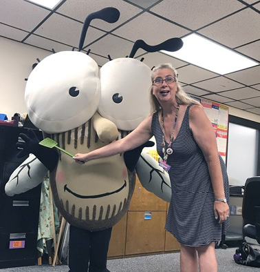 Sharon takes a swat at Tedd Arnold’s Fly Guy character during a visit to Brown County Library in Green Bay, WI, this past summer.
