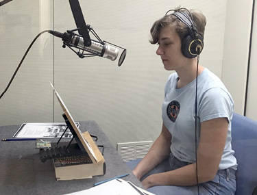 Sam and Isaac (top photo) monitor a recording and Piper (bottom photo) records an audiobook in the recording studio.