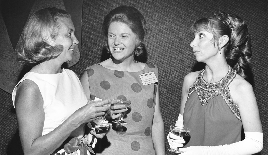 From left, Newbery winner Betsy Byars chats with Newbery-Caldecott committee member Dorothy Anderson and Caldecott winner Gail Haley at the Banquet in 1971.