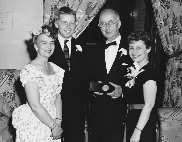 From left, Elizabeth Groves (Children’s Library Association chair), William Pene du Bois (Newbery winner), Frederic Melcher, and Virginia Chase (Children’s Library Association vice chair), circa 1948.