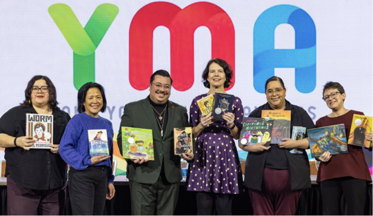 Members of the Pura Belpré committee and David López (third from l), REFORMA president.