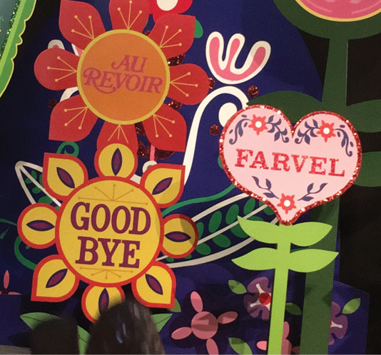 Good bye signs is multiple languages.