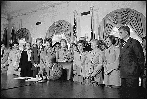 Figure 2. Photograph of Jimmy Carter Signing Extension of Equal Rights Amendment (ERA) Ratification, 10/20/1978.