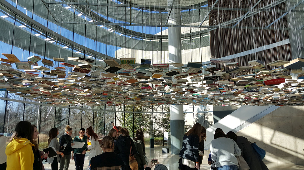 Students visit an Indianapolis Museum of Art installation that artistically questions the efficacy of books as a sole source for knowledge acquisition. Image credit: Turner and Lucas.