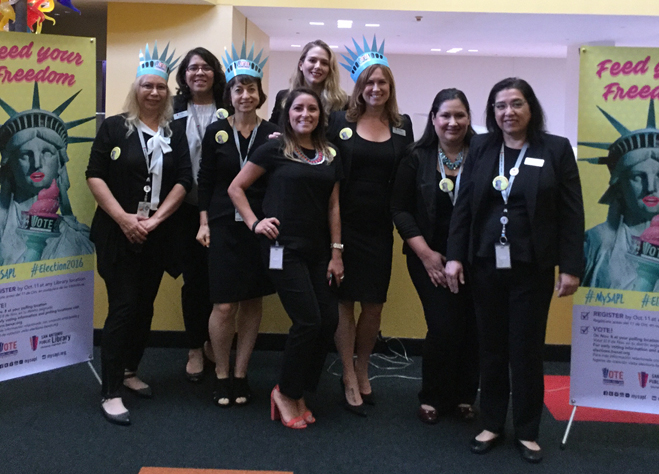 Marketing Team (left to right): Anna Farr, Graphic Designer; Regina Villalobos-Perez, Marketing Specialist; Giselle Weyte, Graphic Designer; Karla Vasquez (front), Marketing Specialist; Maria Garza (back), Graphic Designer; Caitlin Cowart, Community & Public Relations Manager; Marcie Hernandez, Senior Public Information Officer; Esther Sanchez, Community Relations Coordinator.